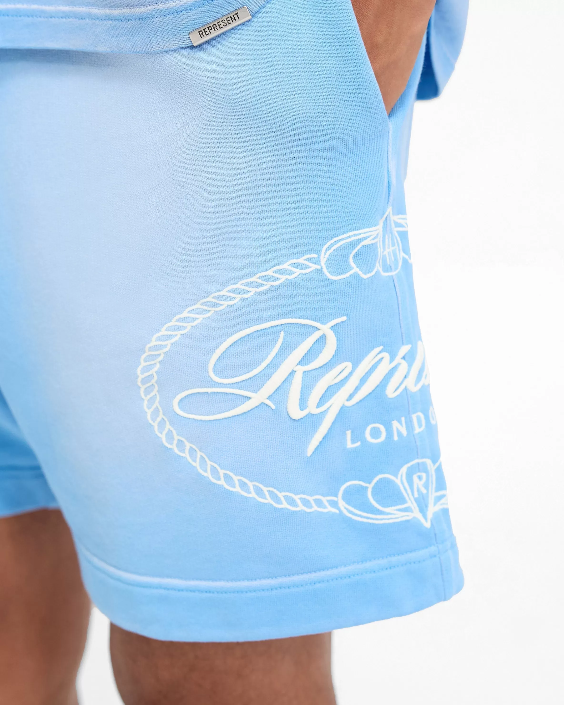 represent_x_harrods_crest_short__cloud_blue_5.webp X Harrods Crest Short - Cloud Blue^Represent Best